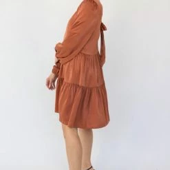 Among The Brave Fashion Deluxe Copper LS Balloon Sleeve Tie Back Tiered Mini Dress