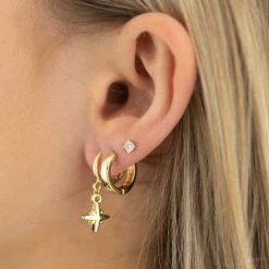 Flo Gives Back The Northern Star Huggie Gold Hoop Earrings Accessories